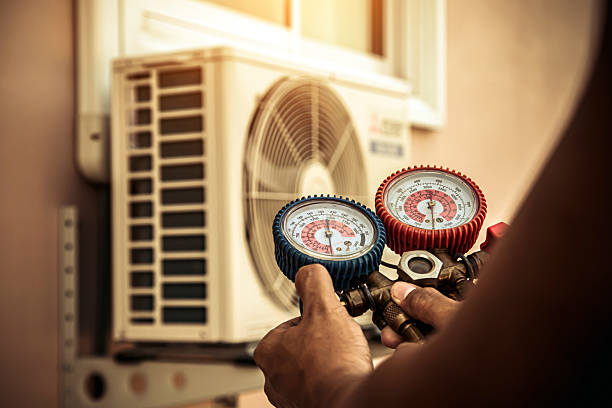 Professional Air Conditioning Service technician working in Watertown, WI